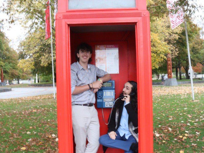 Jordan Sits in Phonebox